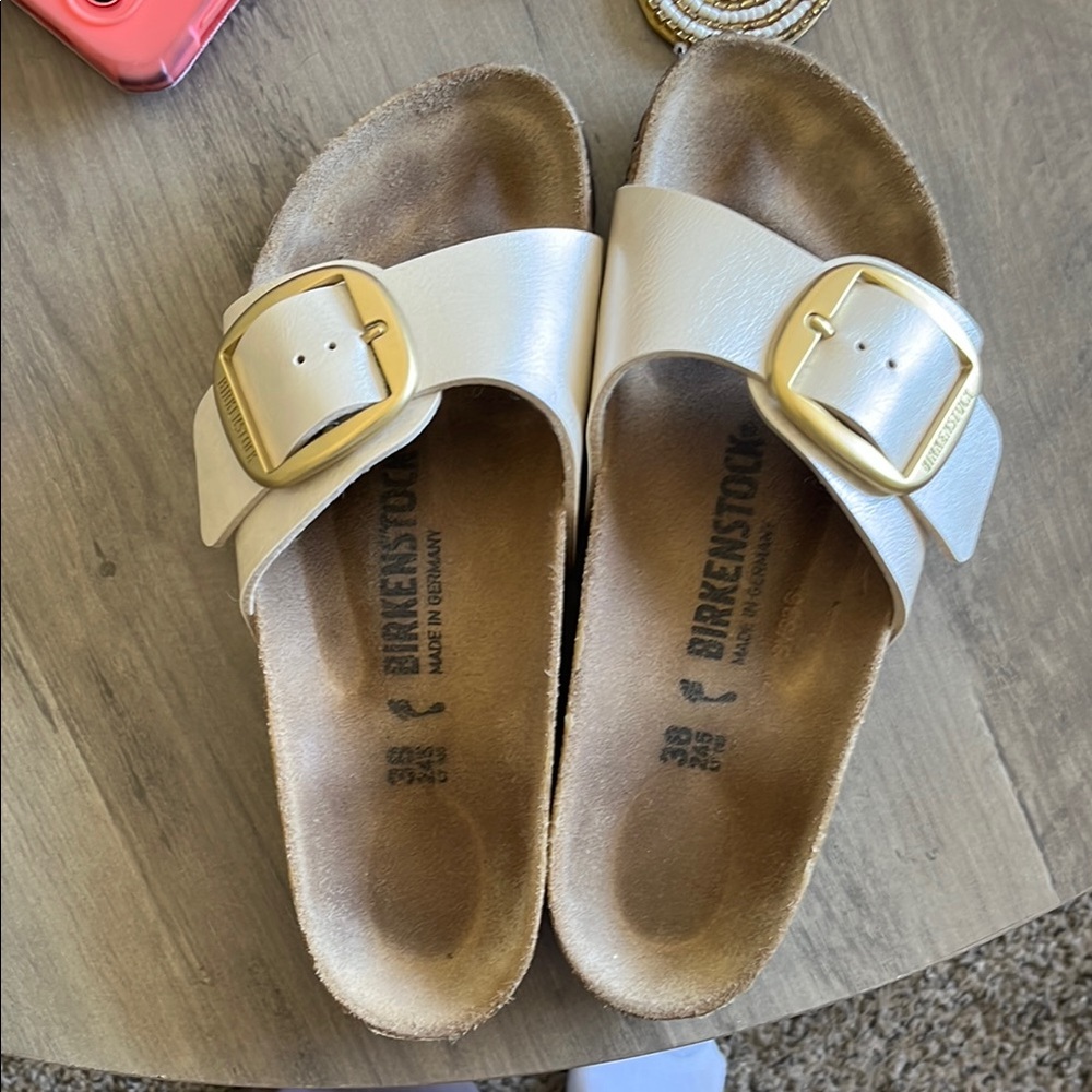Birkenstock Off-White Sandals with Gold Buckle